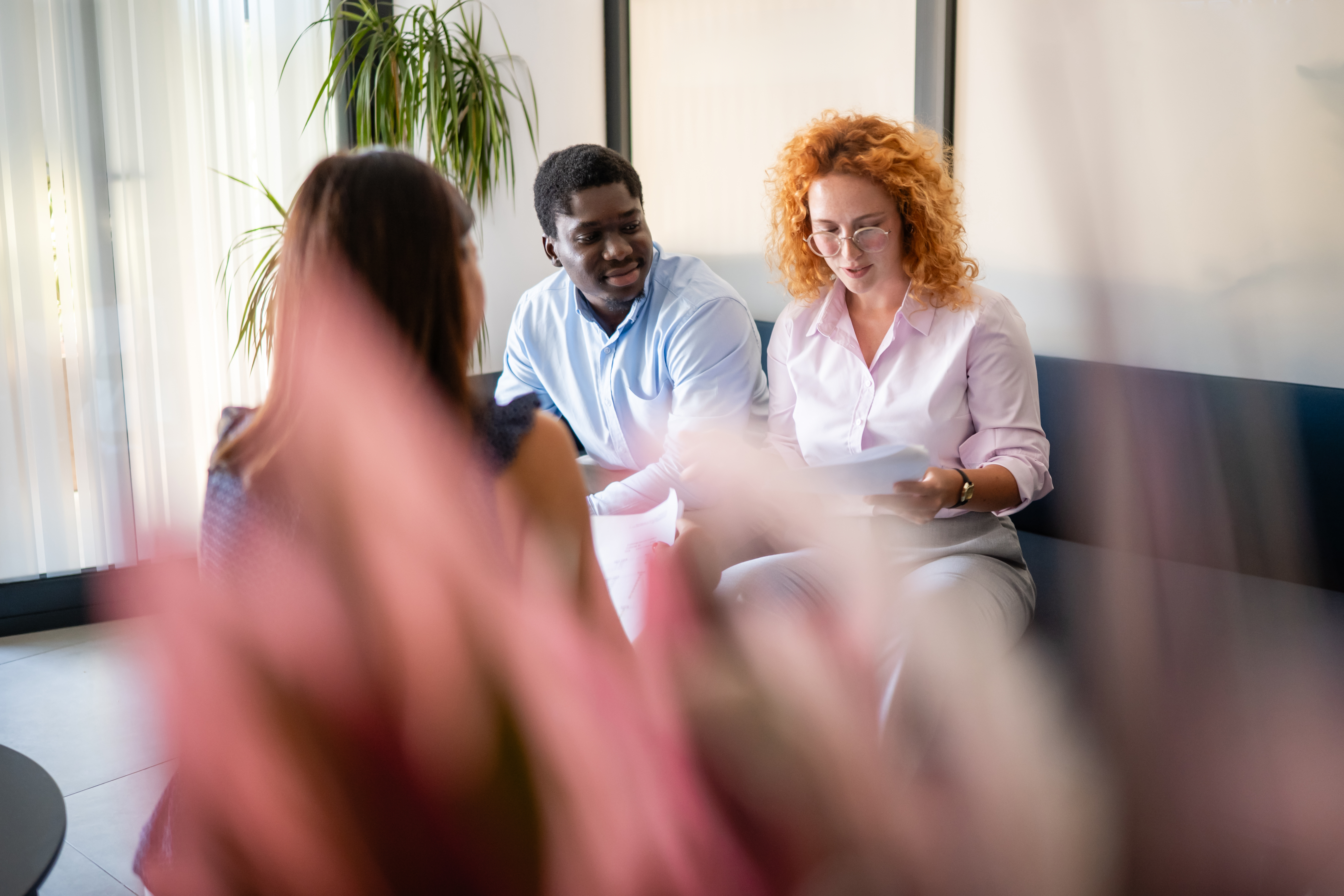 Business team meeting with diverse coworkers discu