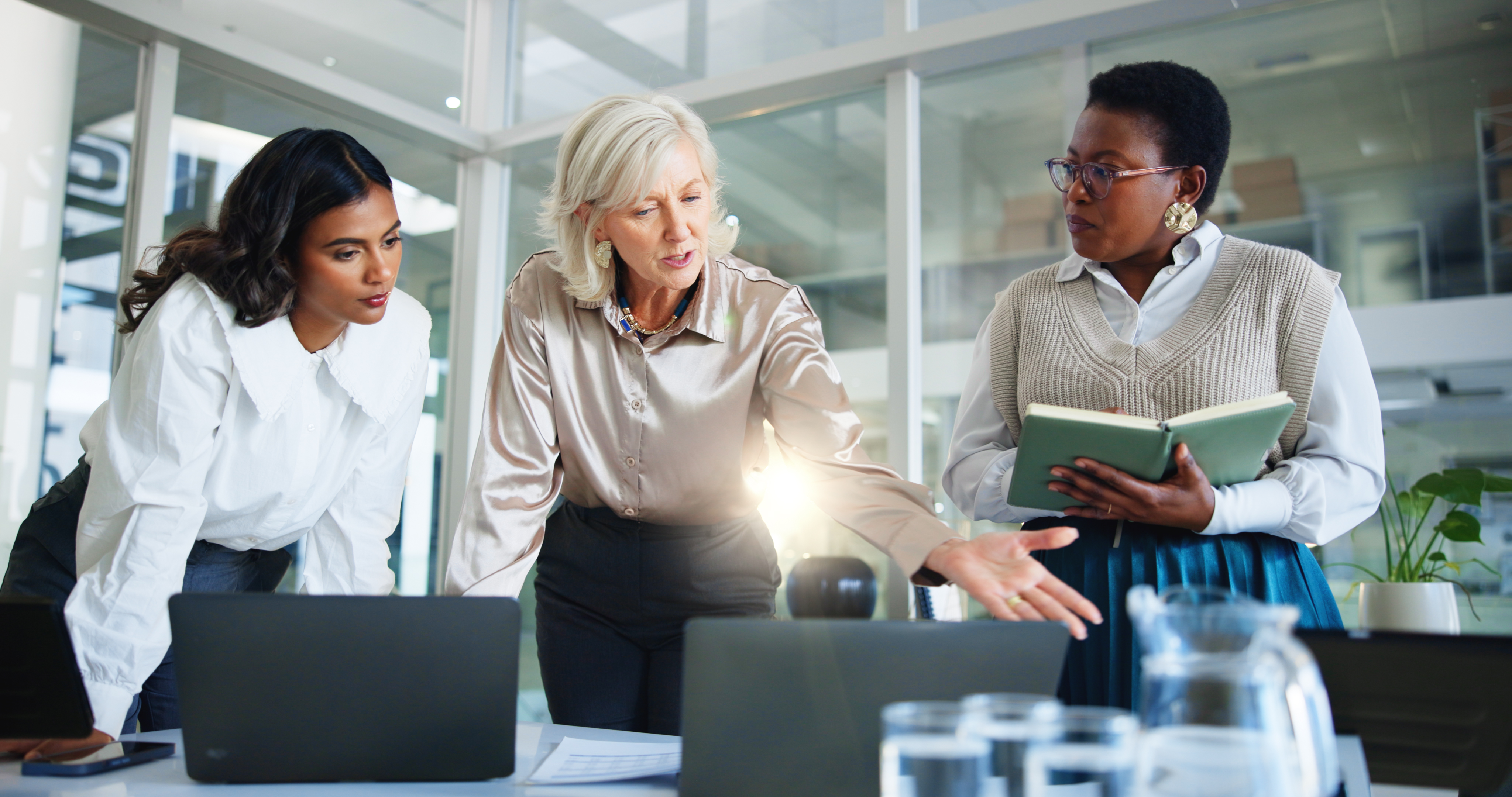 Business women coach and meeting with laptop for