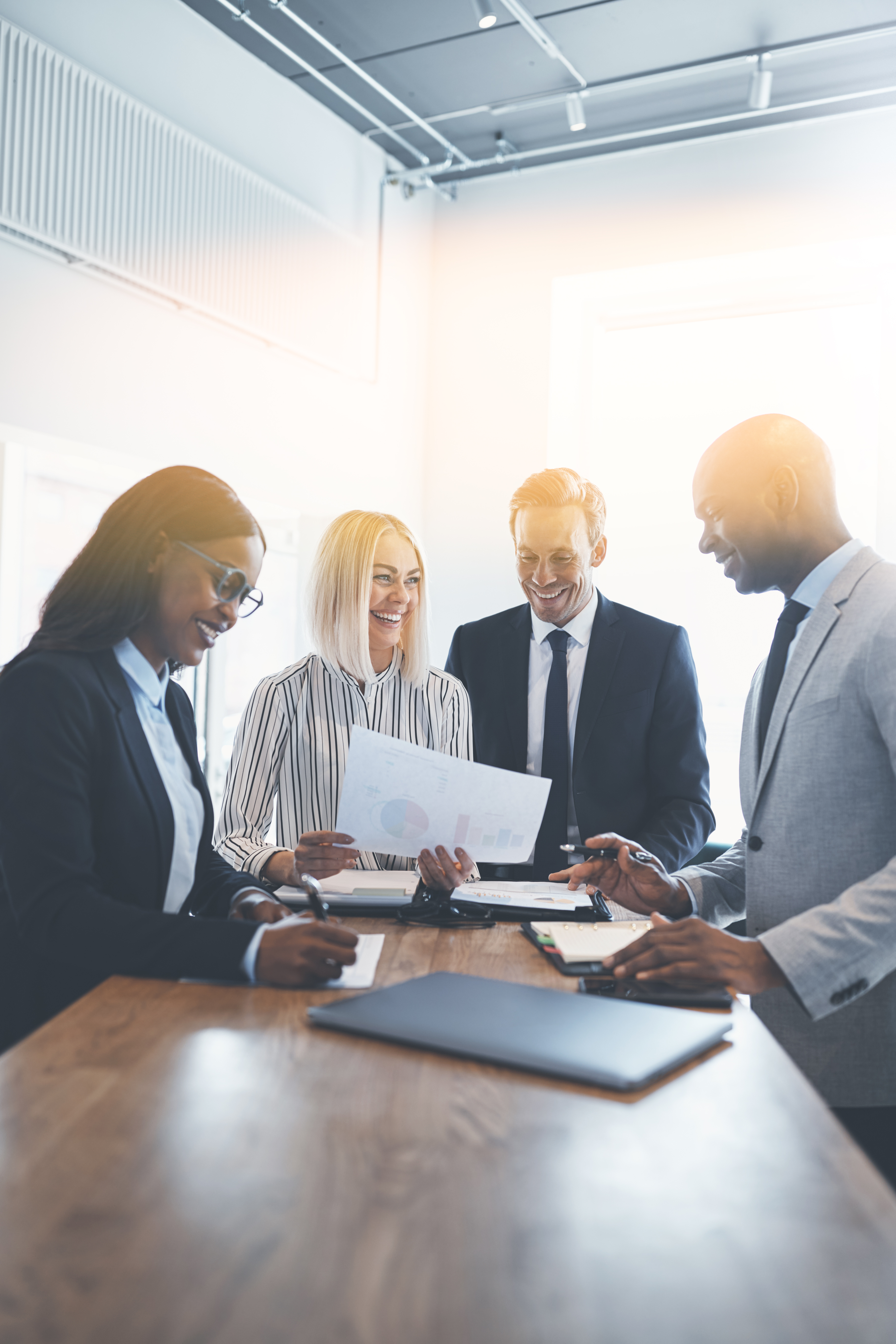 Diverse group of smiling businesspeople working