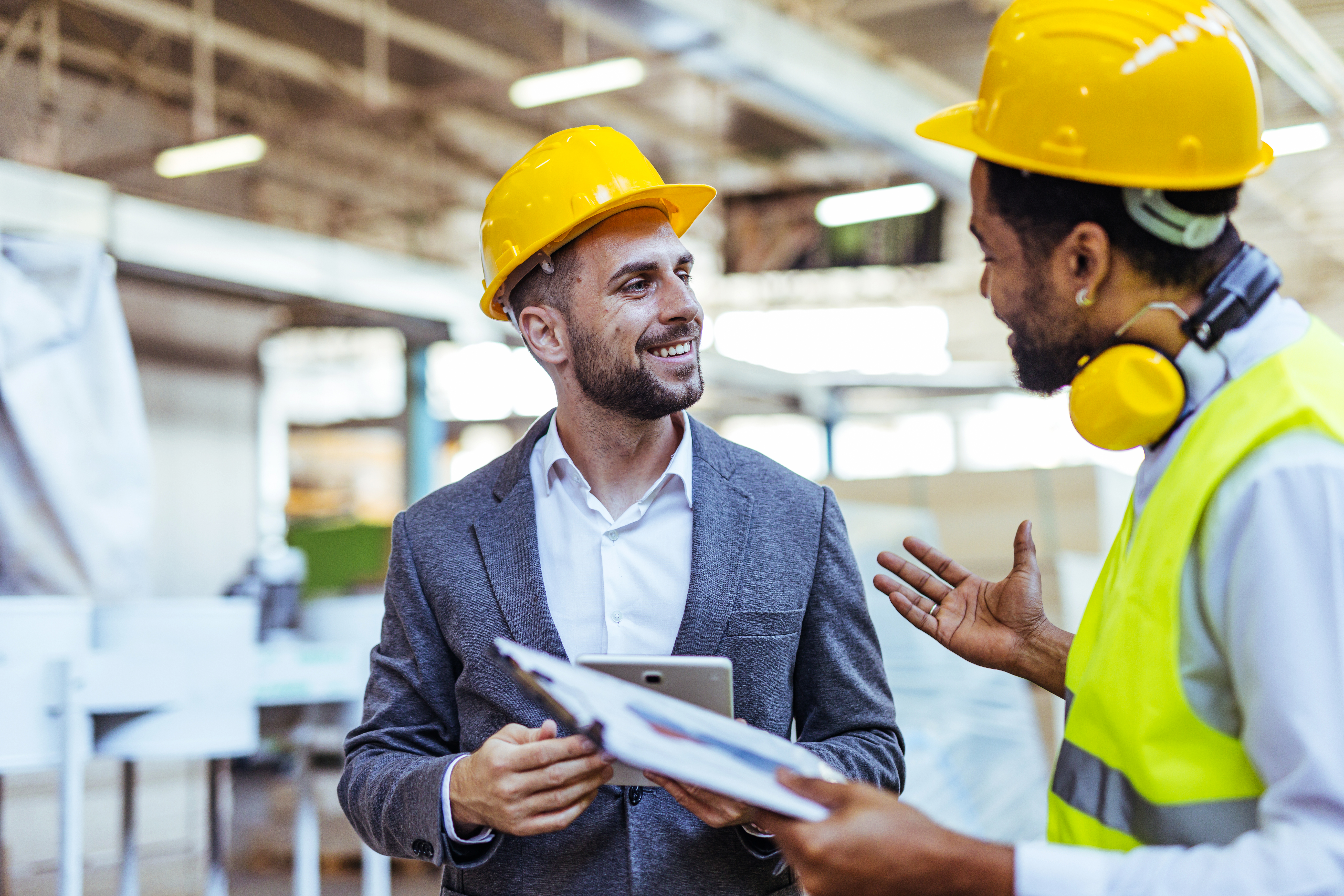 Engineers discussing industrial projects