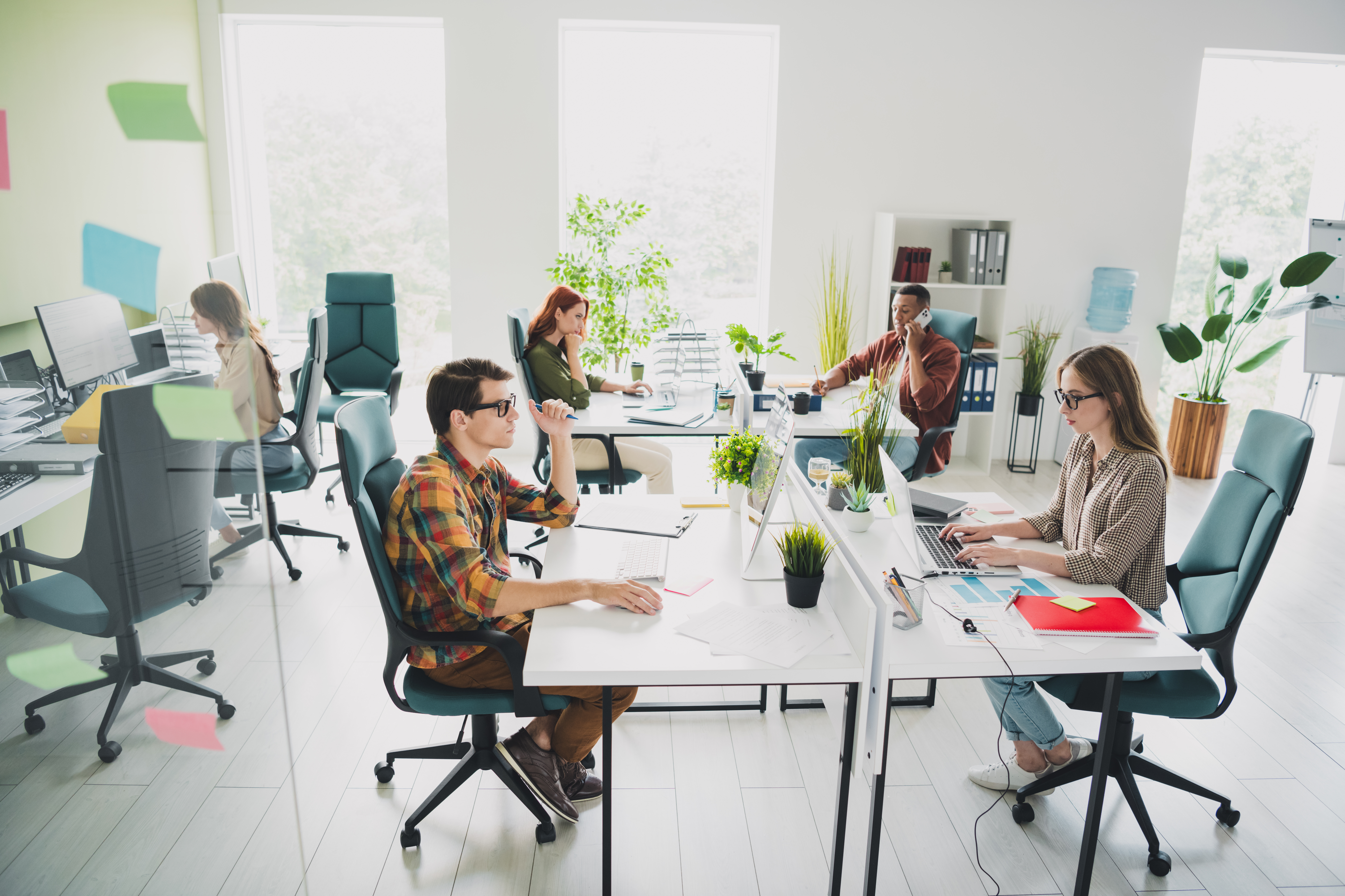 A young team working together professionally in an office
